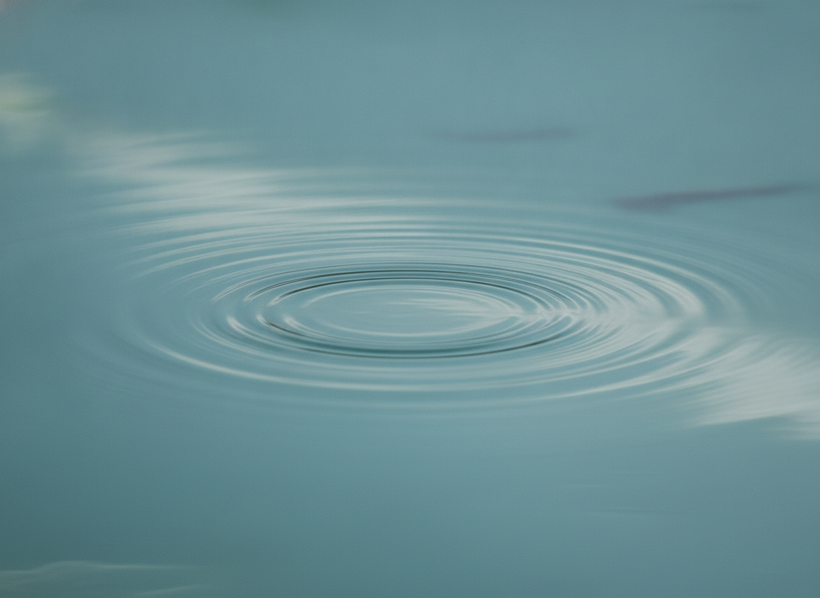 Gentle ripples on still water representing calm