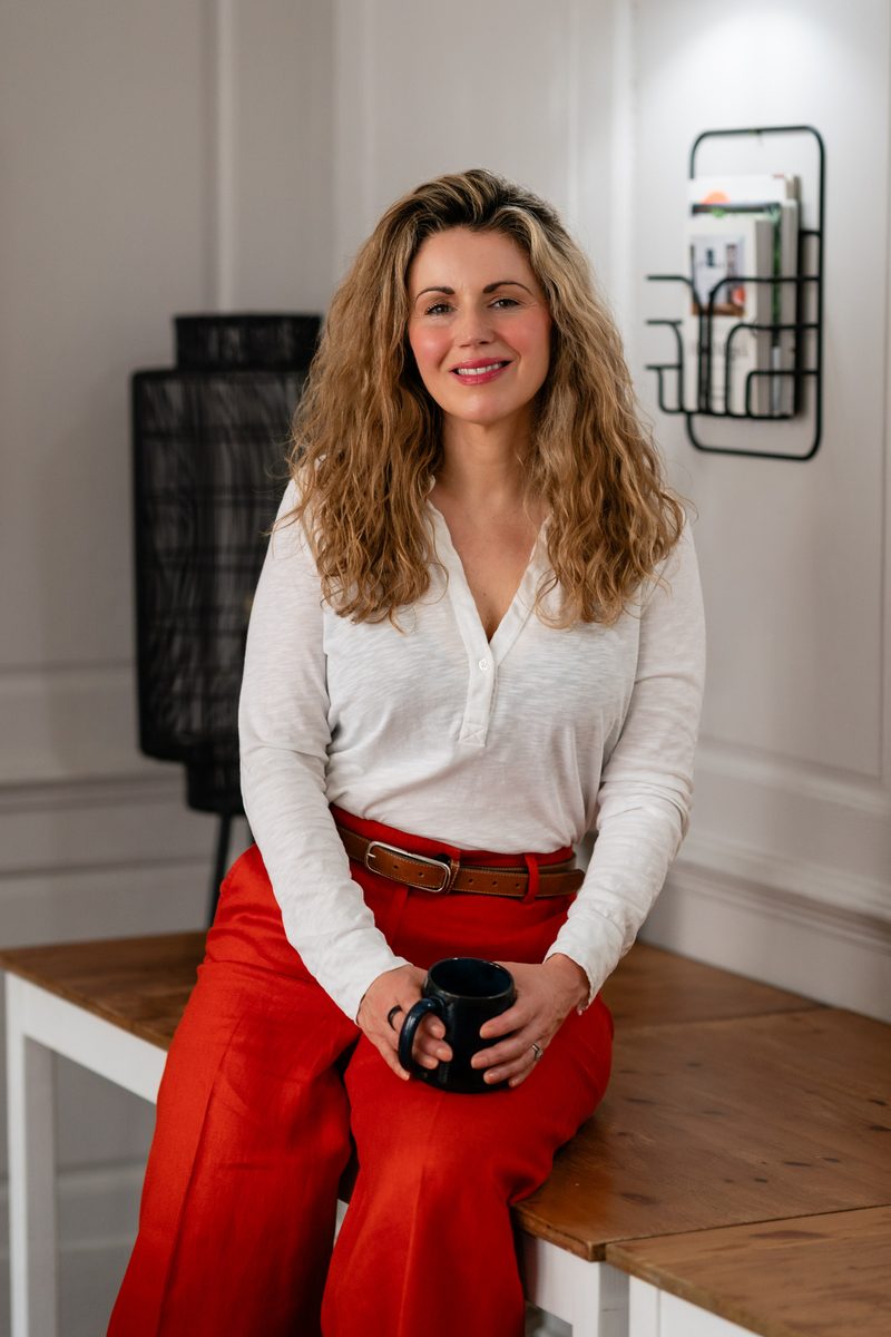 Karlina Jordan beside her 'Courage Within' print